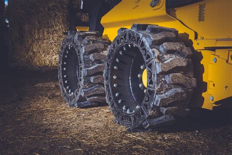 wheel skid steer vs track|10x16.5 skid steer wheels.